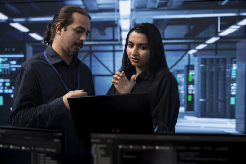 Coworkers discuss data loss prevention solutions